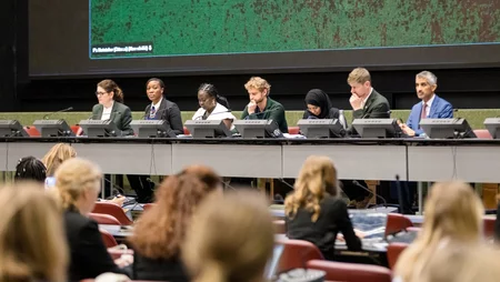 Panel in front of the audience.